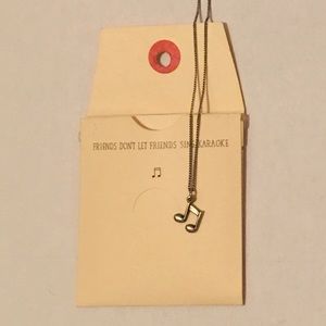 Music note necklace in original pouch